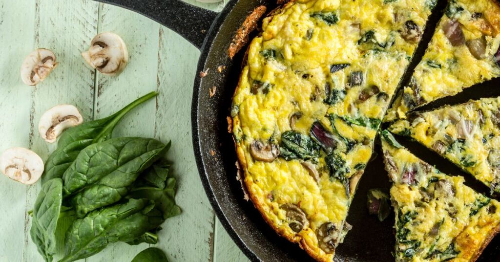 Baked spinach frittata with cottage cheese and eggs in a pie dish, WW friendly