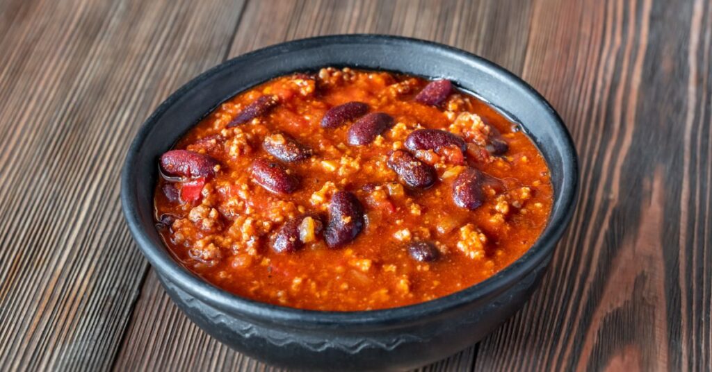 Bowl of hearty zero-point chili with turkey, beans, and spicy tomato broth.