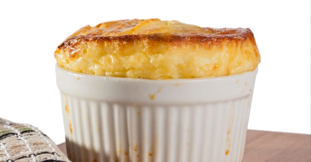 Zero Point Banana Mug Muffin Soufflé in a white bowl topped with cinnamon